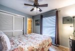 guest bedroom, queen size bed, ceiling fan, closet, wood floors